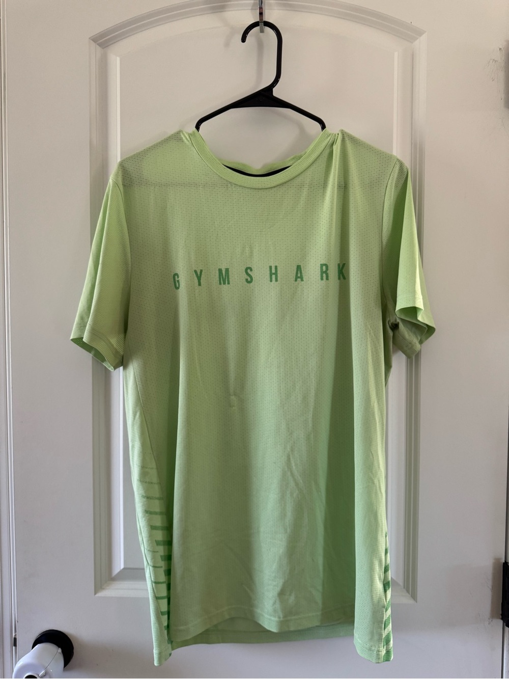 Gymshark Men’s Lime green athletic top.